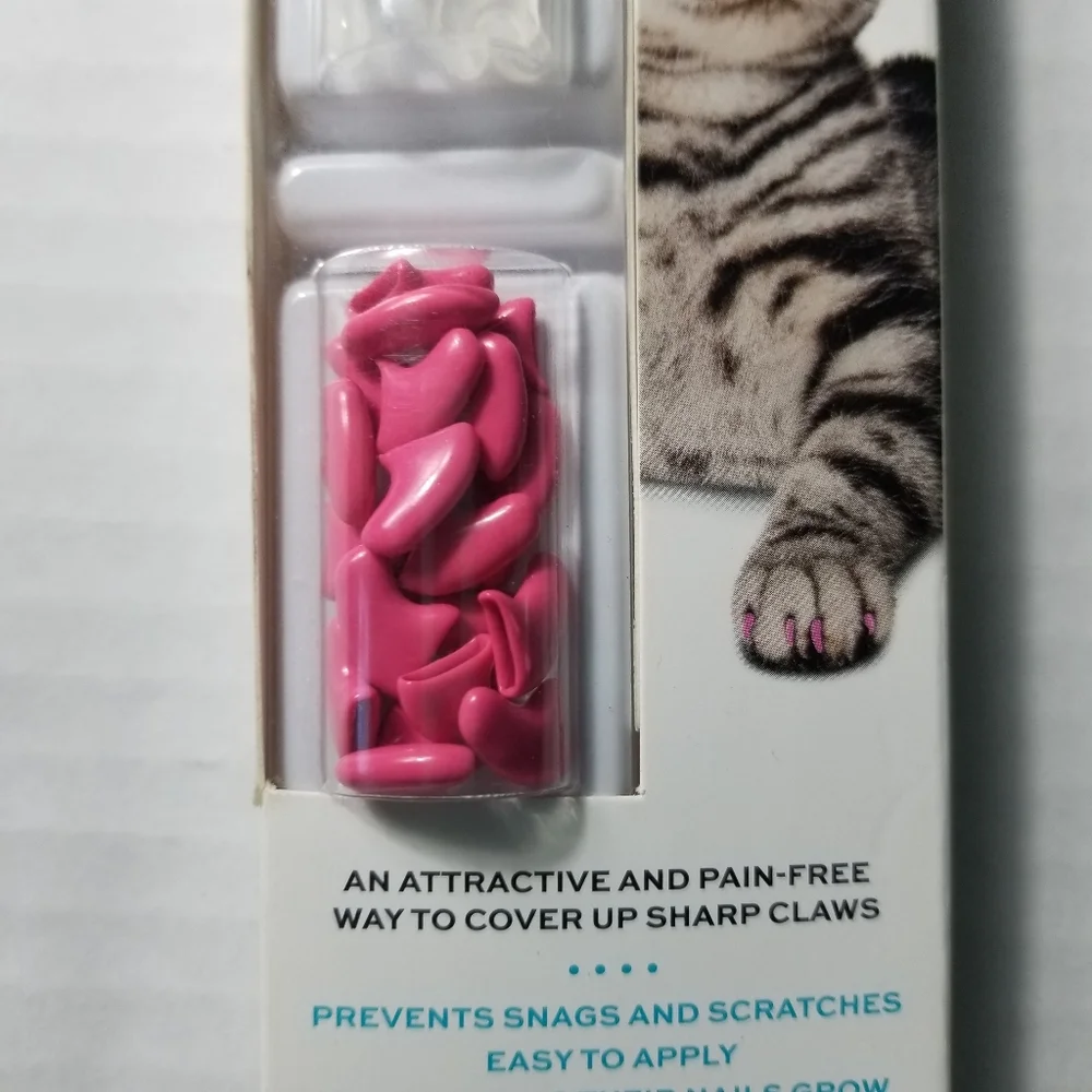 NEW IN BOX WELL AND GOOD CAT NAIL CAPS